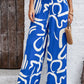 Devine Smocked Printed Wide Leg Pants with Pockets