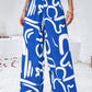 Devine Smocked Printed Wide Leg Pants with Pockets