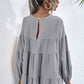 Shiny Round Neck Dropped Shoulder Tiered Blouse