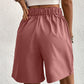 Pocketed Half Elastic Waist Shorts