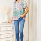 Perfee Floral Tie Neck Short Sleeve Blouse