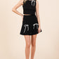 GeeGee 2-Bow Pleated Mini Skirt