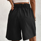 Pocketed Half Elastic Waist Shorts