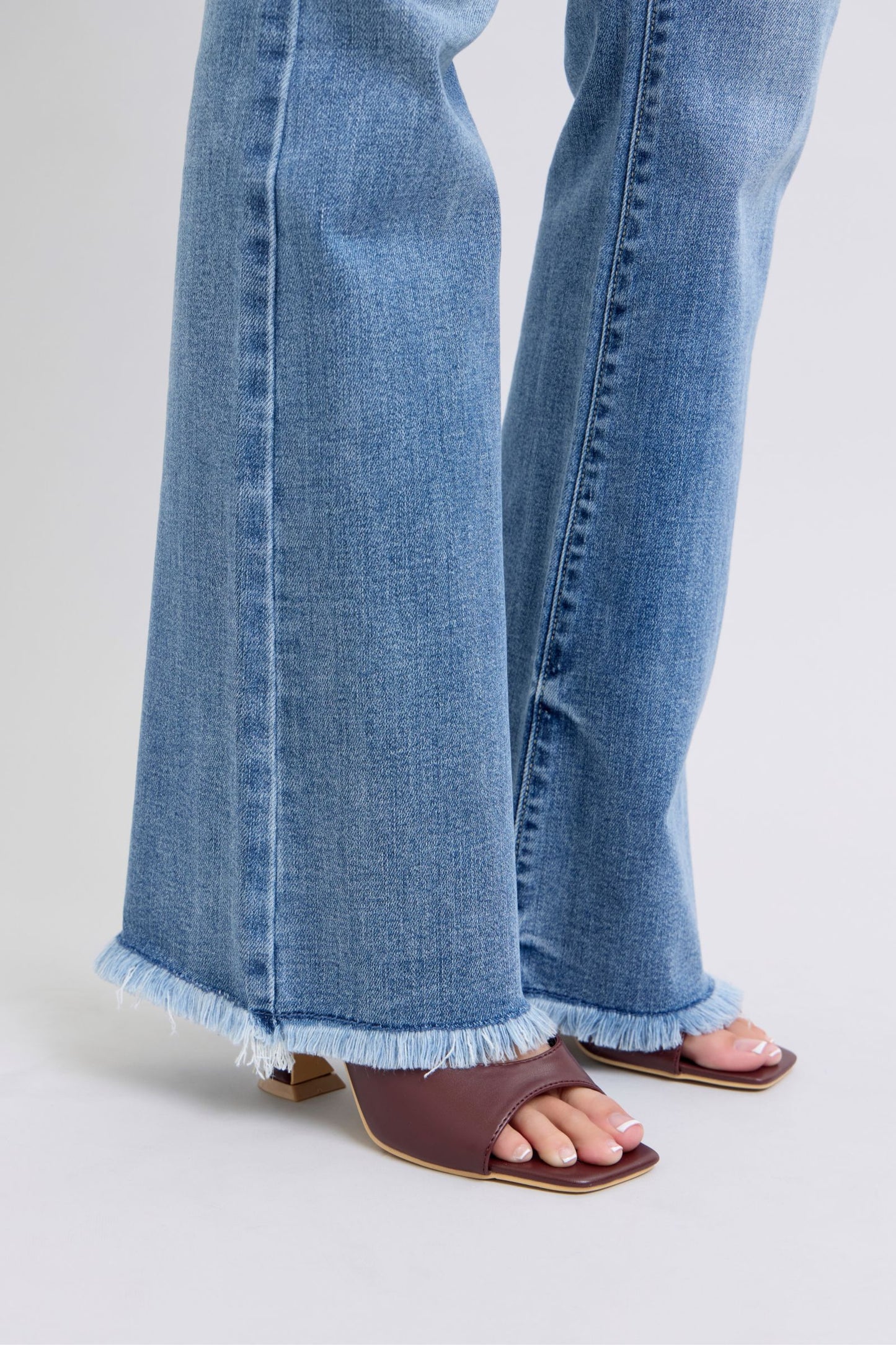 Judy Blue Raw Hem High Rise Bootcut Jeans—0-24W