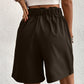 Pocketed Half Elastic Waist Shorts